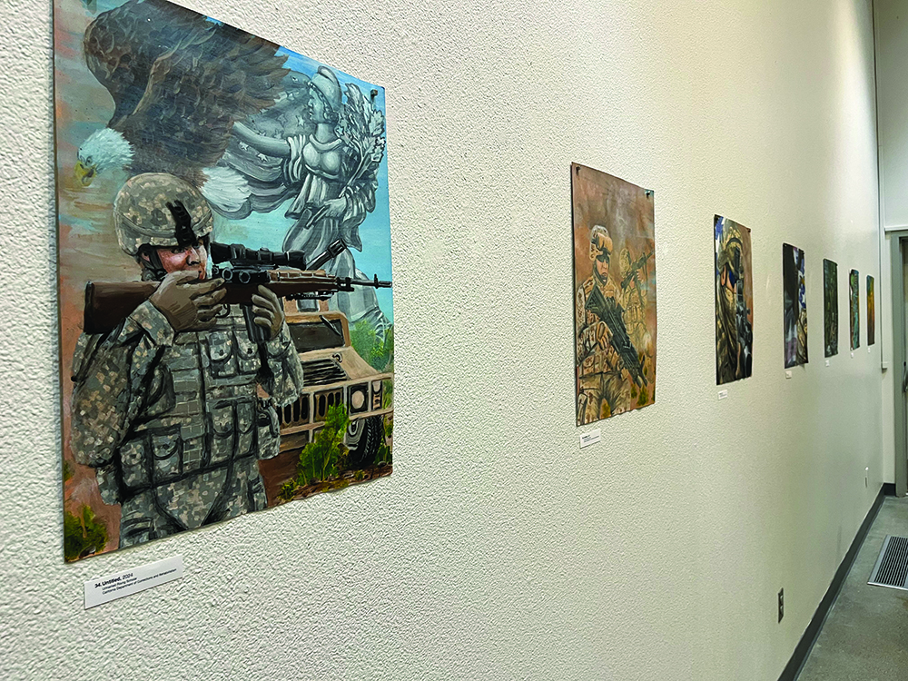 series of military based paintings covering the back wall 