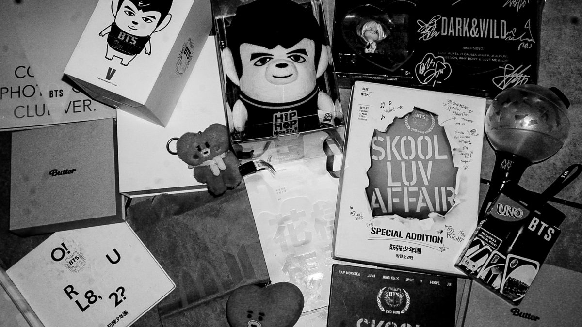 A BTS fan collection full of albums and merch dating back to their debut.