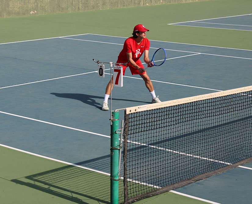 Zeb Duket serves and Anthony Renteria is ready
