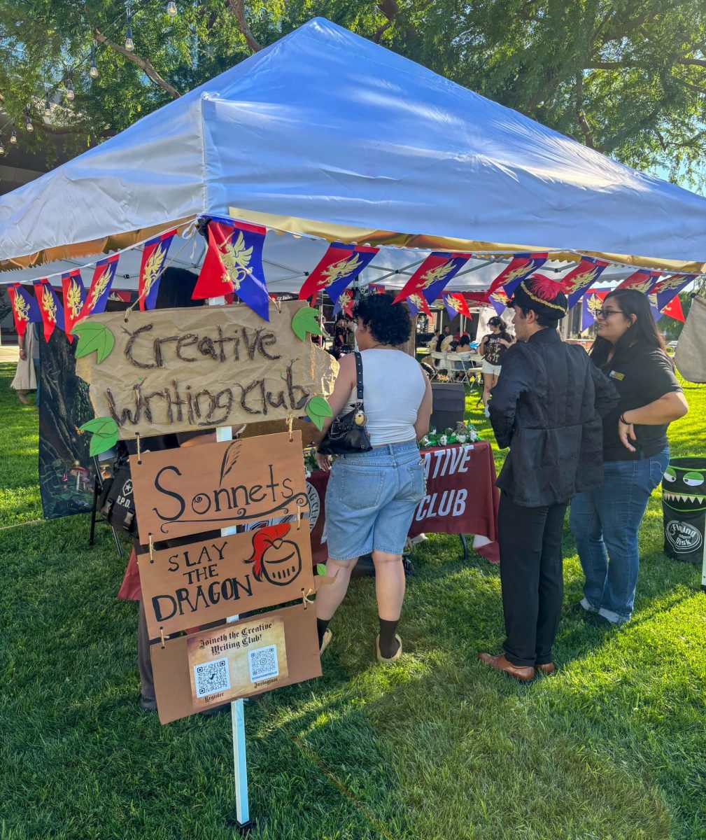 BC students at the creative writing club booth during the BC Renaissance fair on March 25.